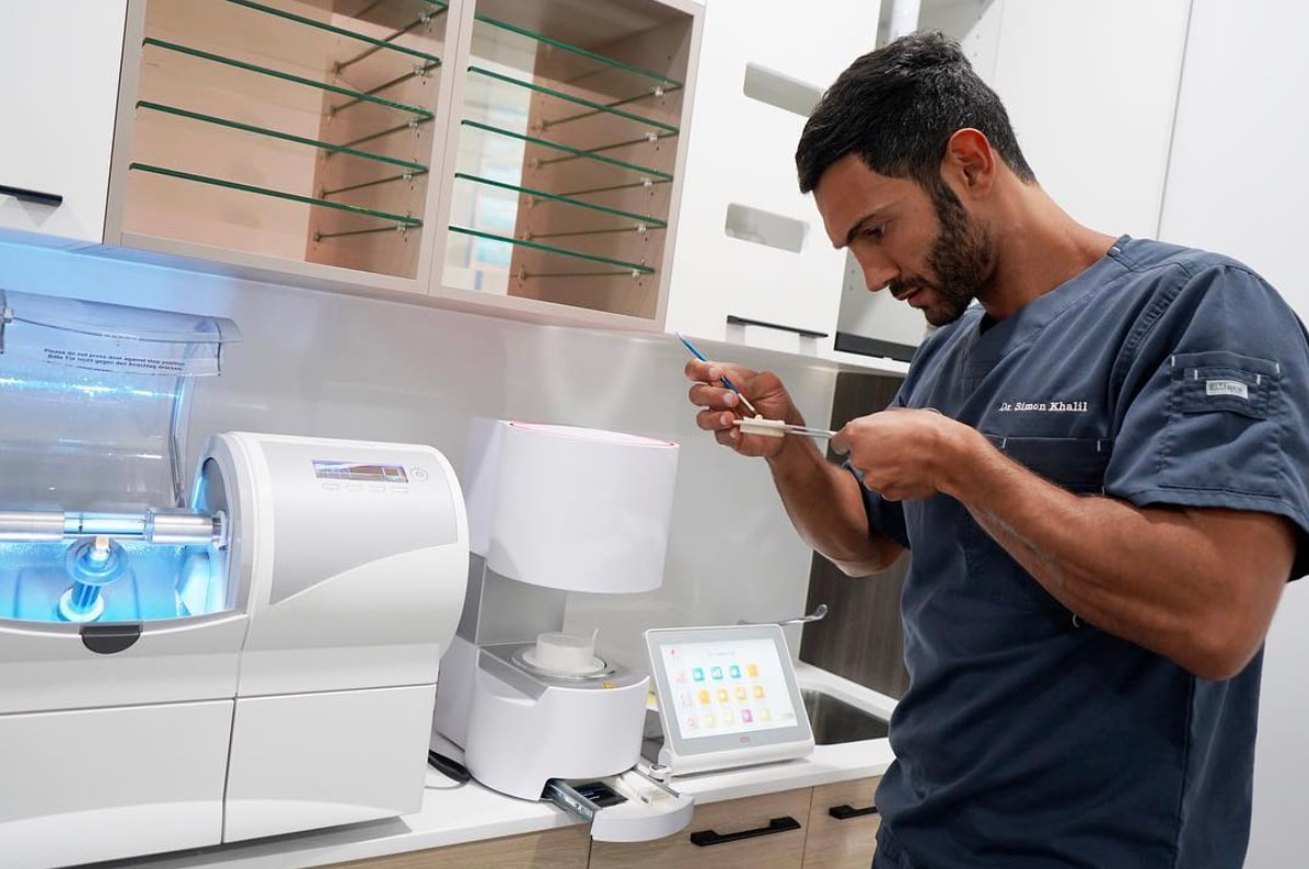 Marrickville Dentist Dr Simon Khalil working with the 1-hour dental crown machine